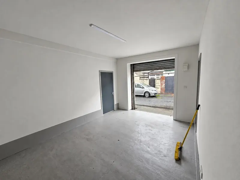 Inside a Business Spaces unit with the roller shutter open onto the yard